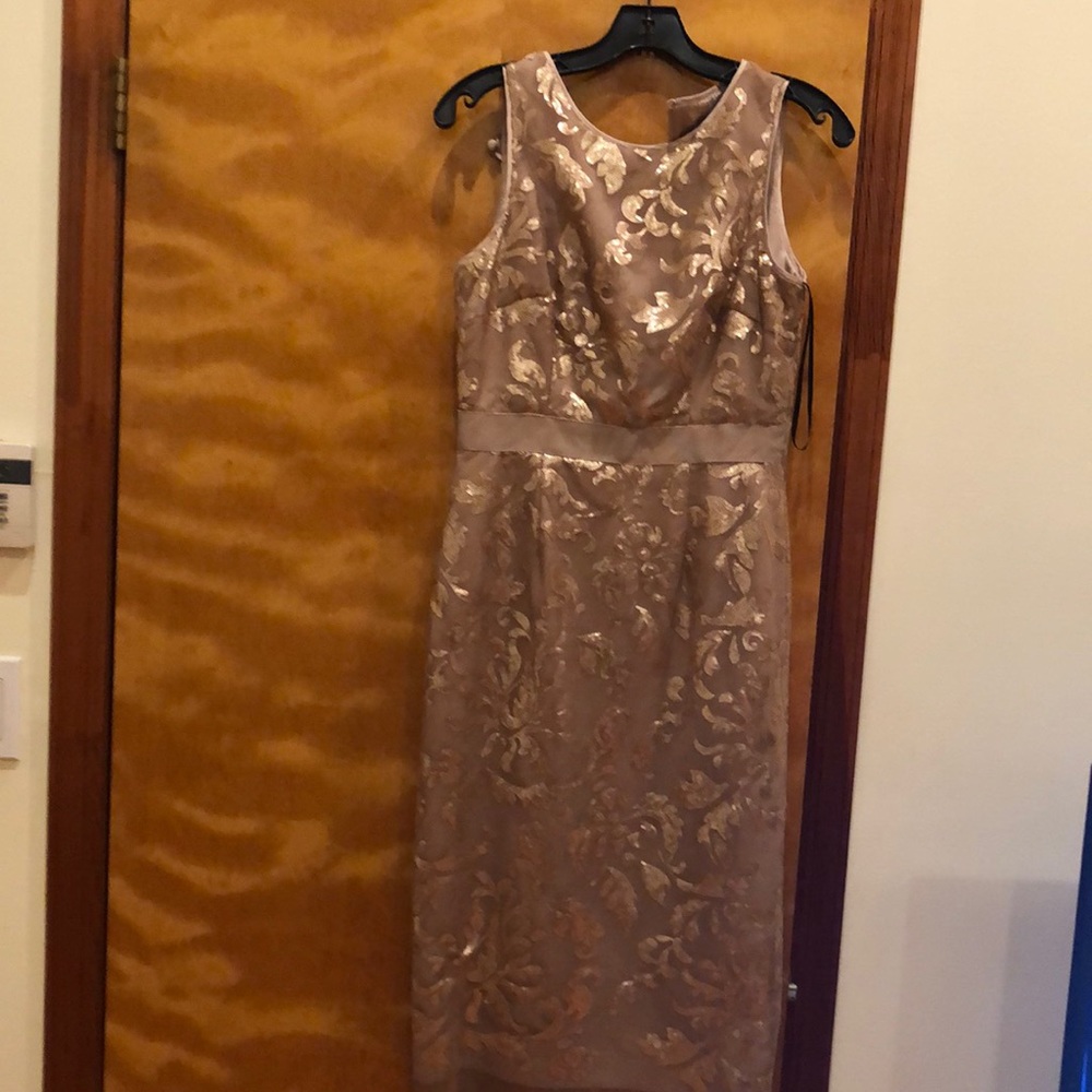 Vince Gold sequence cocktail dress.  Cap leave below the knee.   Very elegant